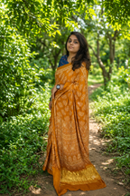 Mustard Ajrakh Print Saree with Gold Zari Border