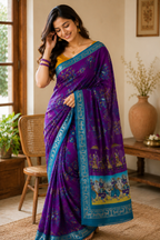 Purple Pen Kalamkari Saree with Teal Zari Border