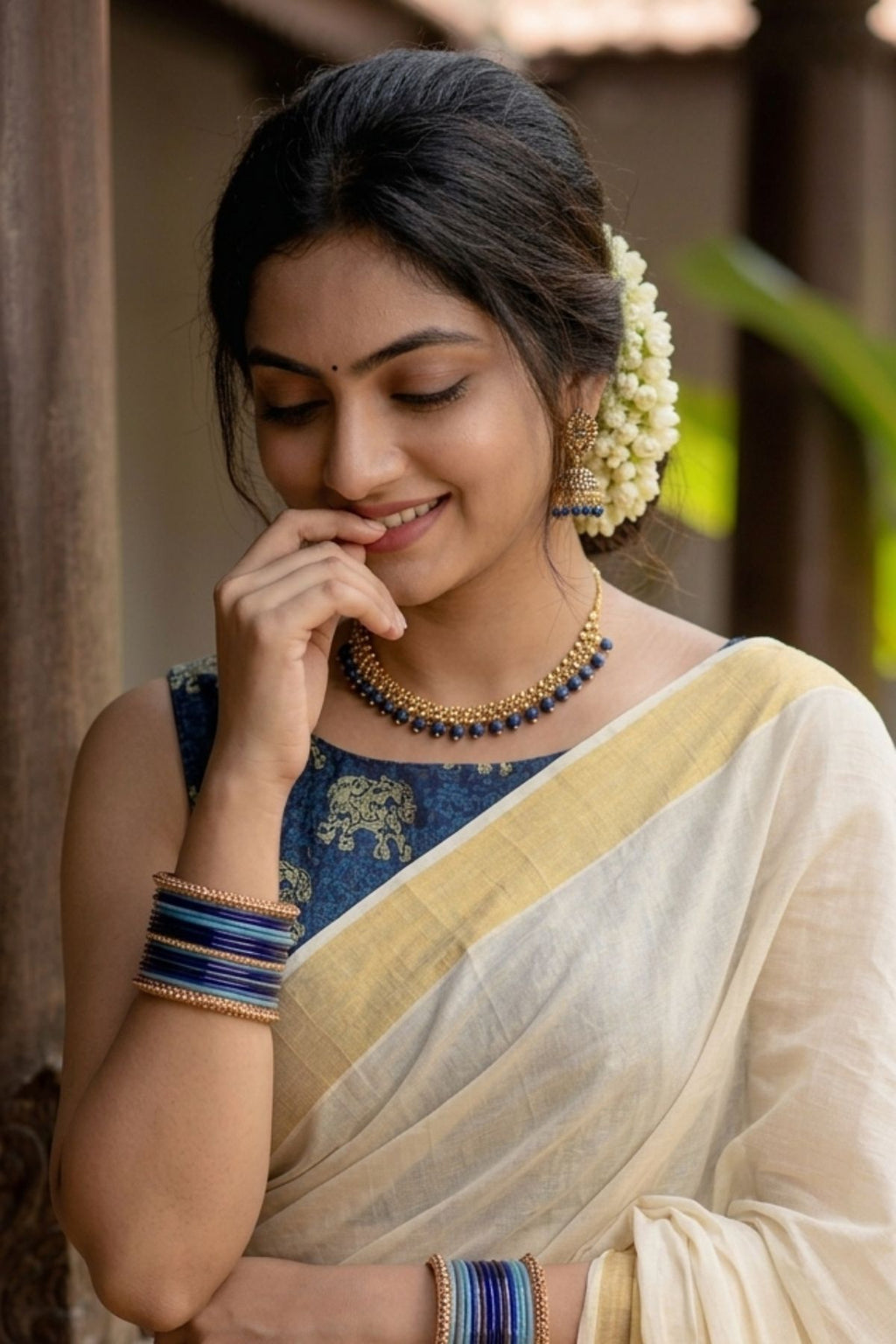 Kasavu Pure Cotton Saree with Navy Ajrakh Elephant Print & Gold Border