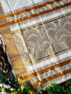 Golden Lotus Jacquard Cotton Kasavu Saree with Orange Border & Blouse