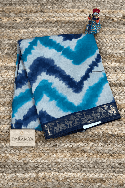 Blue Tie-Dye Linen Silk Saree front view — navy blue border on sky blue tie-dye | House of Paramya