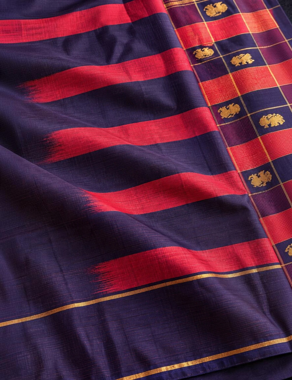 House Of Paramya plum purple soft silk saree with teal green checks, gold zari elephant motifs, and zari border.