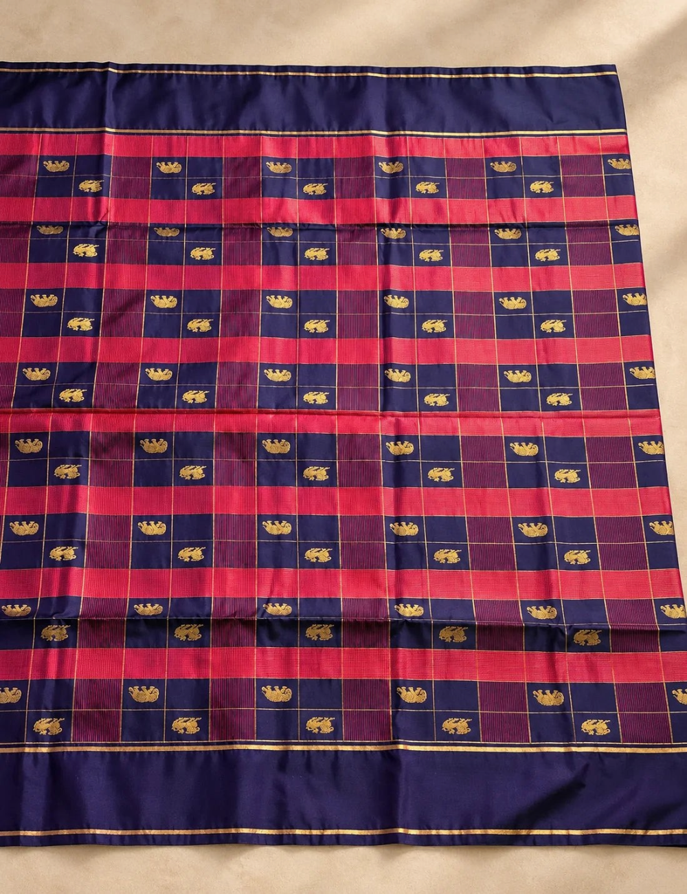 House Of Paramya plum purple soft silk saree featuring teal green checks and woven gold zari elephant motifs.