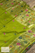 Close-up of multicolour floral weave on gold zari Paithani pallu in parrot green silk saree — House of Paramya