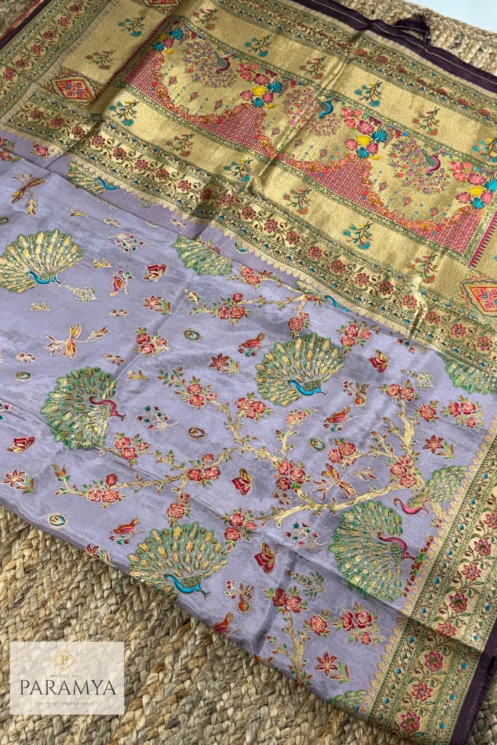 Close-up of antique gold zari pallu with handwoven peacock motifs and floral medallions on lavender Pashmina silk saree - House Of Paramya