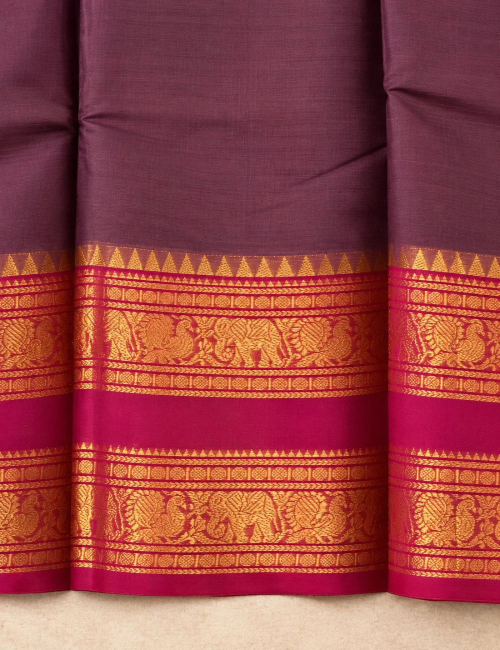 House Of Paramya deep aubergine Chettinad cotton saree with wine border featuring gold zari elephant and floral motifs