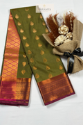 Olive Green Rasipuram Silk Saree with Pink Zari Border