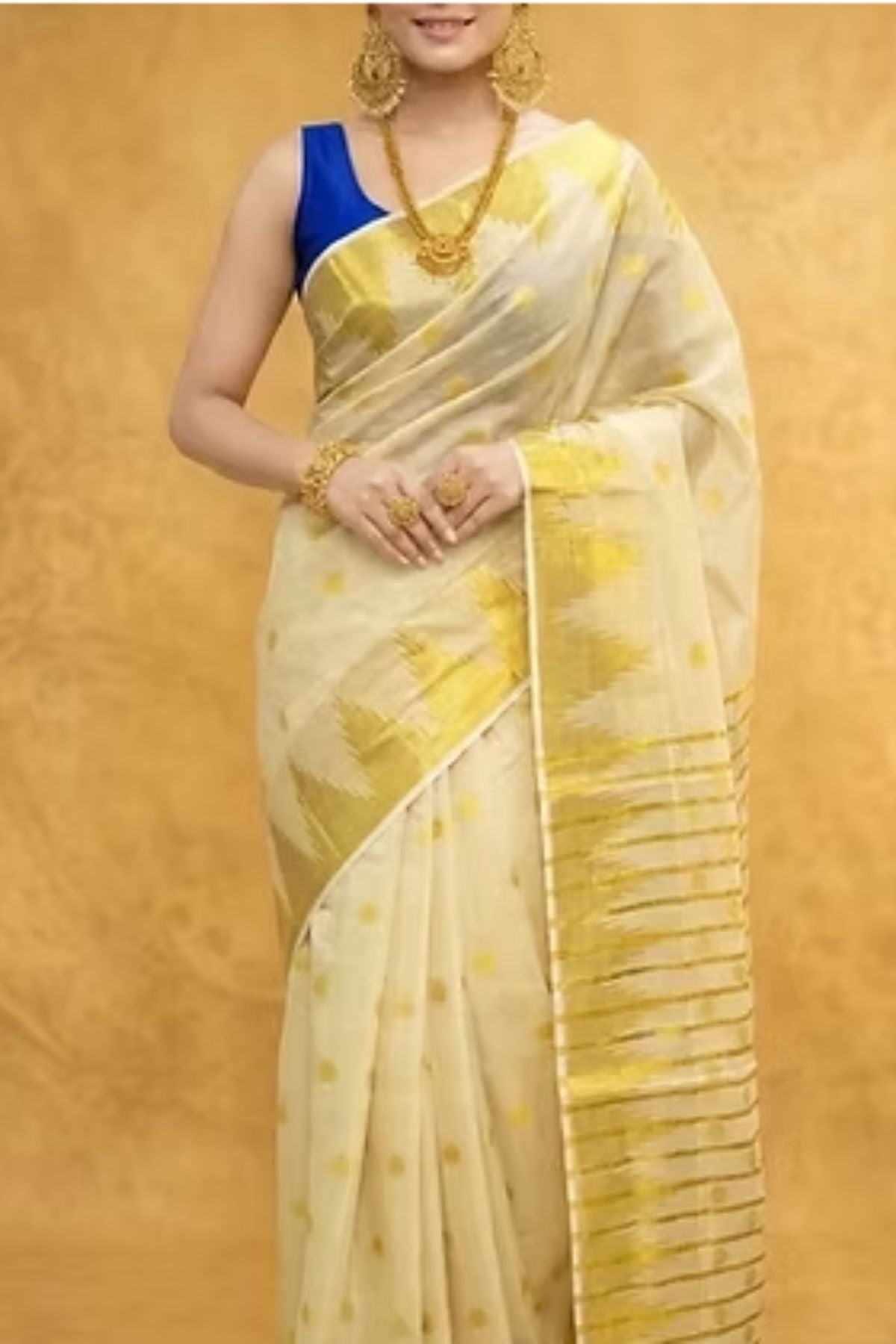 Off-White Temple Border Tissue Kasavu Saree with Golden Polka Design