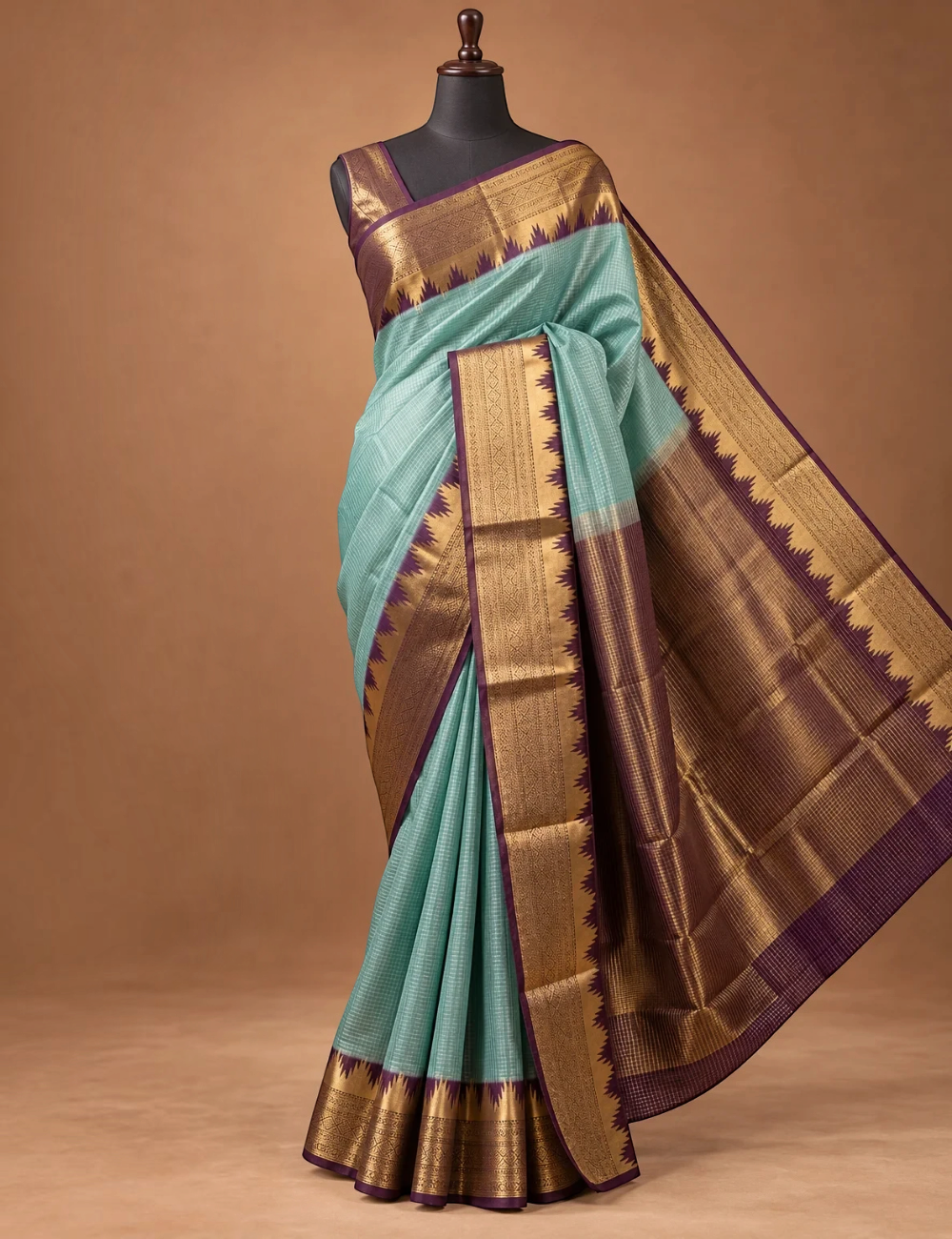 House Of Paramya aqua Mysore crepe silk saree with a purple and gold zigzag temple border and checkered texture.