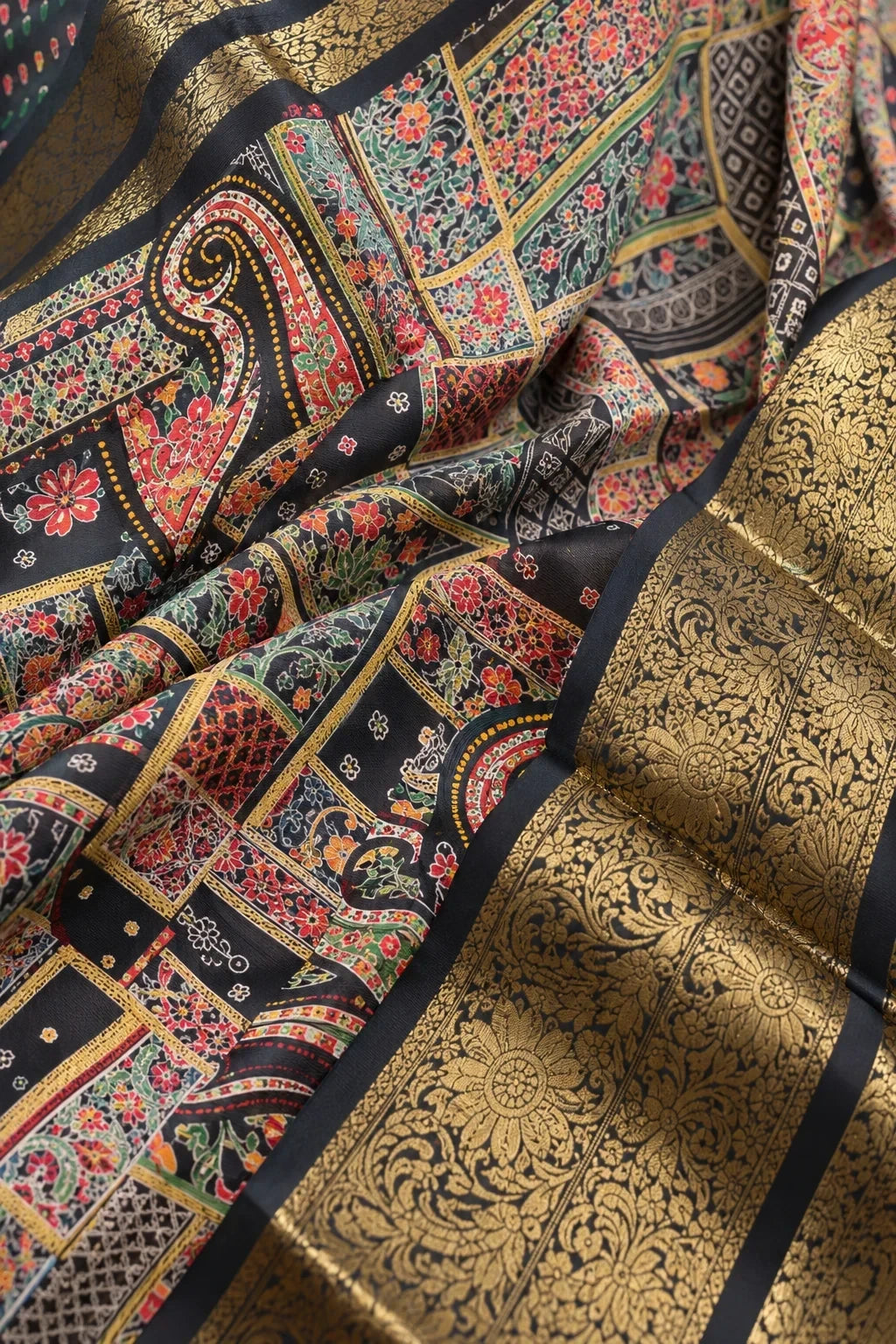 House Of Paramya black georgette saree with multicolor patchwork print, floral motifs, and intricate gold zari border.