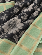 House Of Paramya black soft Kota silk saree with floral print and sage green zari check border and pallu