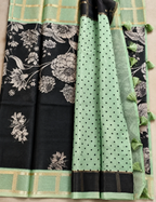 House Of Paramya black soft Kota silk saree with floral print and sage green zari check border and tassel pallu