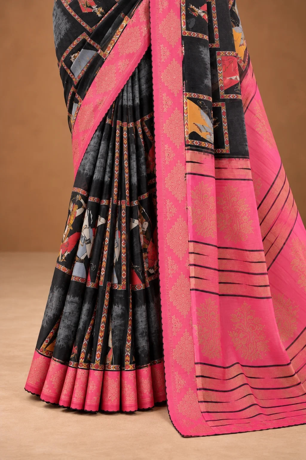 House Of Paramya black georgette saree with traditional prints and a vibrant pink border featuring delicate stone work.
