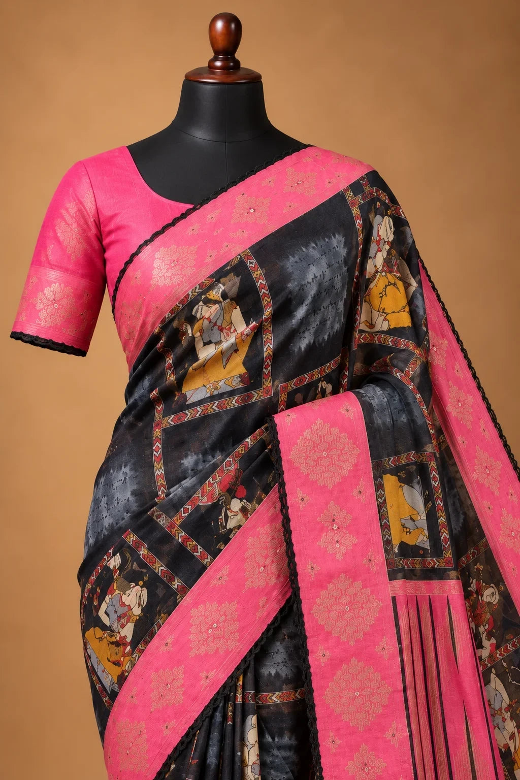 House Of Paramya black georgette saree with traditional prints, pink border, stone work, and matching blouse piece.
