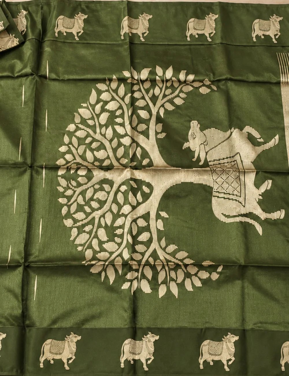 House Of Paramya black raw tussar silk saree featuring intricate gold zari Pichwai cow and tree motifs