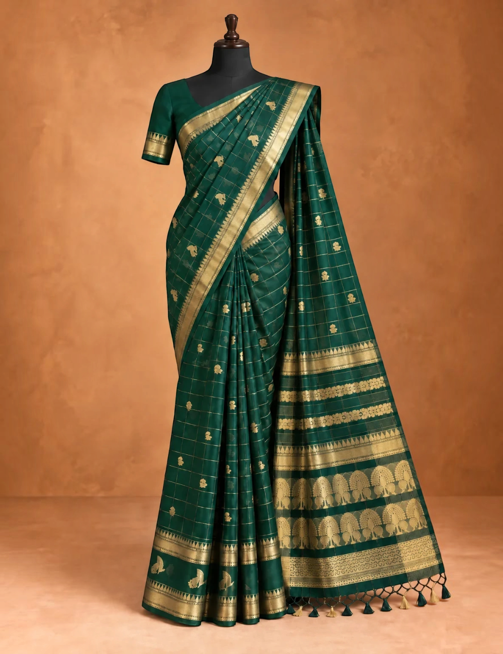 House Of Paramya bottle green raw silk saree with gold checkered weave, floral butis, and a zari vine border.