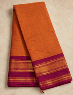 House Of Paramya burnt orange Chettinad cotton saree with a maroon border featuring intricate gold zari rosette motifs.