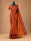 House Of Paramya burnt orange Chettinad cotton saree with a maroon border featuring intricate gold zari rosette motifs.