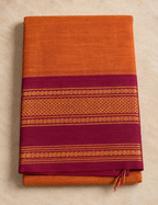 House Of Paramya burnt orange Chettinad cotton saree with a maroon border featuring gold zari rosette and diamond motifs