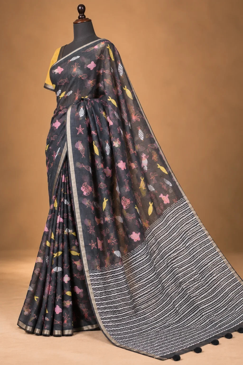 House Of Paramya charcoal linen saree featuring whimsical marine motifs and a black and white chevron striped pallu.