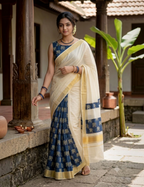 House Of Paramya cream cotton Kasavu saree with navy blue Ajrakh elephant print and traditional gold zari border