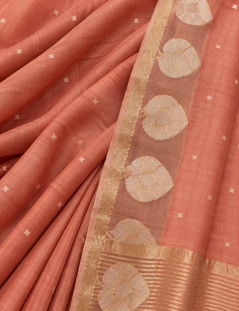 House Of Paramya dusty peach pure organza saree featuring silver-gold woven butti motifs and a zari border