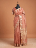 House Of Paramya dusty peach pure organza saree with silver-gold woven butti motifs and a zari border on a mannequin.