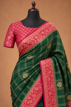 House Of Paramya emerald green georgette saree with magenta pink floral zari border and gold checkered weave