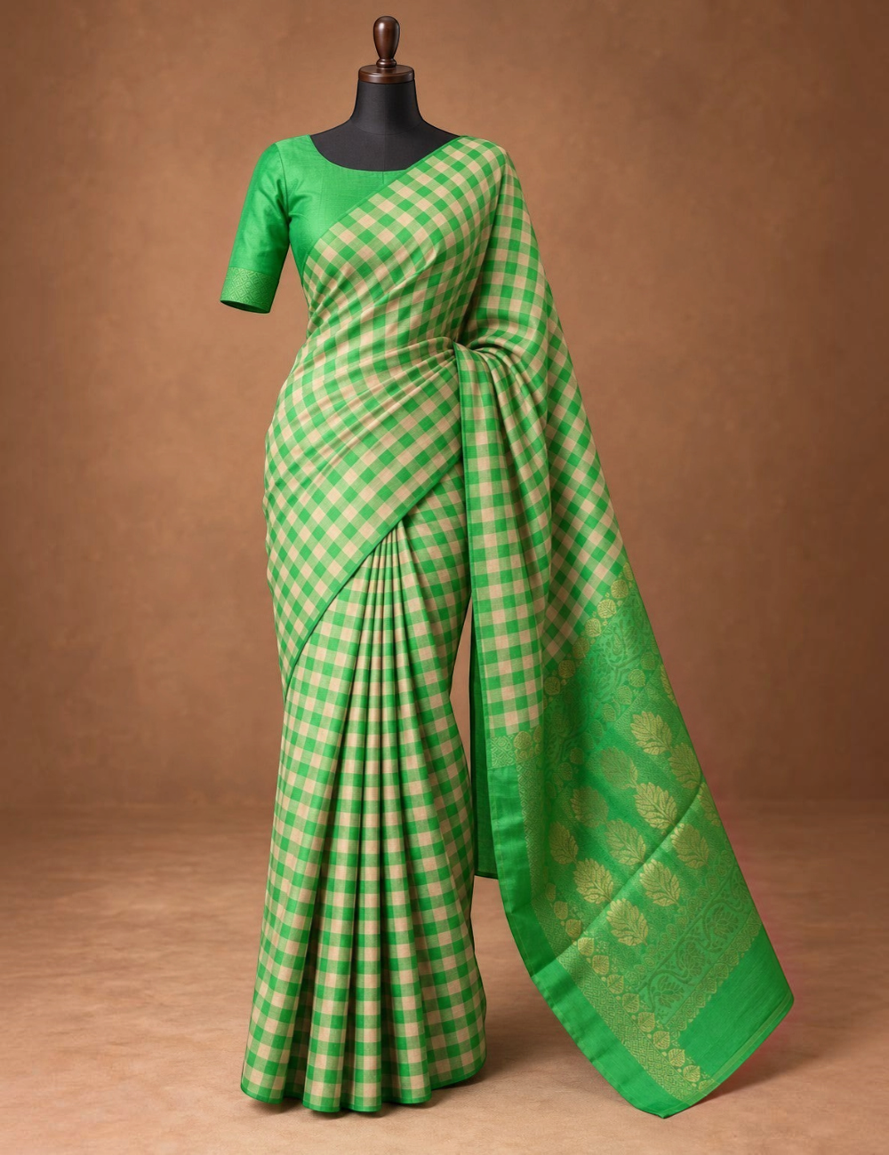 House Of Paramya emerald green Kanchipuram silk saree with a checked pattern and intricate gold zari floral border.