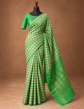 House Of Paramya emerald green Kanchipuram silk saree with a checked pattern and intricate gold zari floral border.