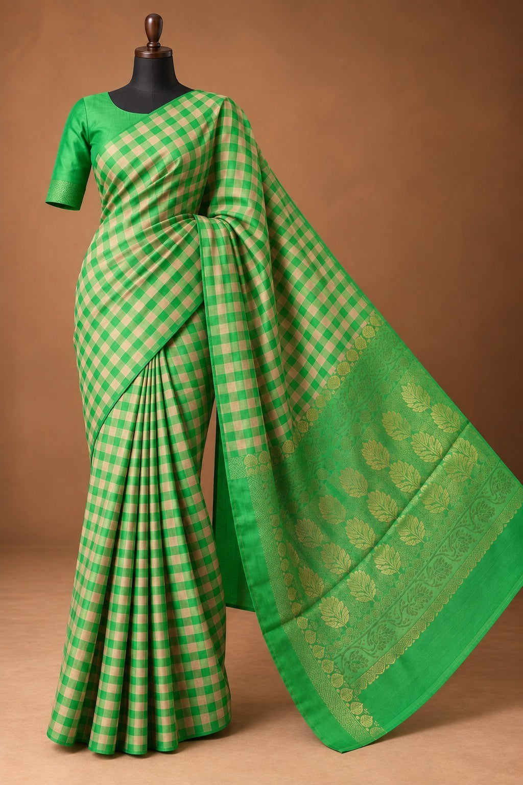House Of Paramya emerald green Kanchipuram silk saree with a traditional checked pattern and gold zari floral border.