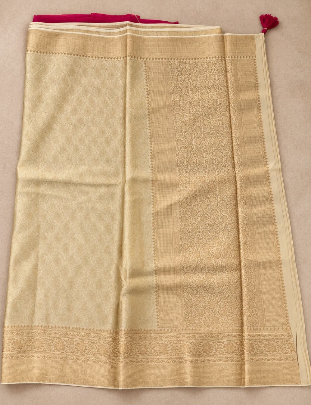 House Of Paramya gold vegan viscose silk saree featuring a Kanchipuram-style brocade weave and intricate border.