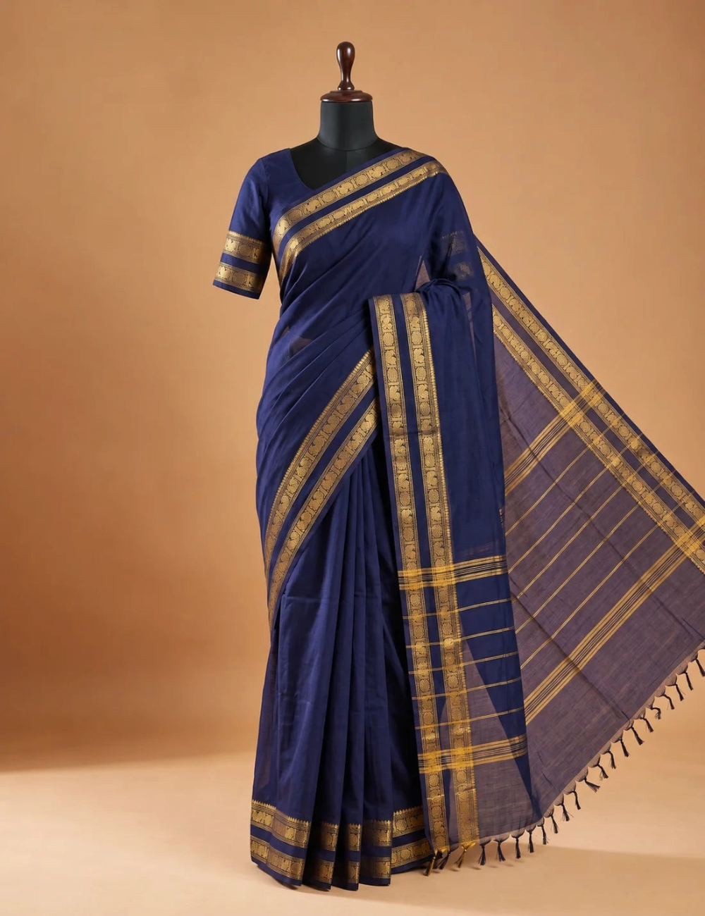 House Of Paramya midnight indigo Chettinad cotton saree with antique gold zari peacock and medallion border on mannequin