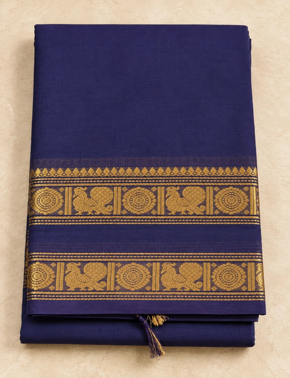 House Of Paramya midnight indigo Chettinad cotton saree with antique gold zari peacock and medallion woven border.