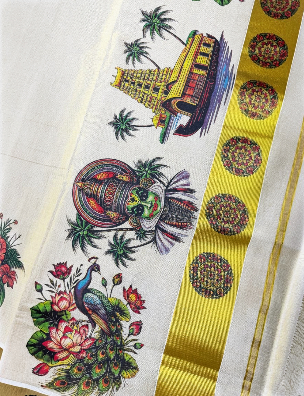 House Of Paramya ivory tissue cotton Kasavu saree featuring a gold zari border and colorful Kerala mural print.