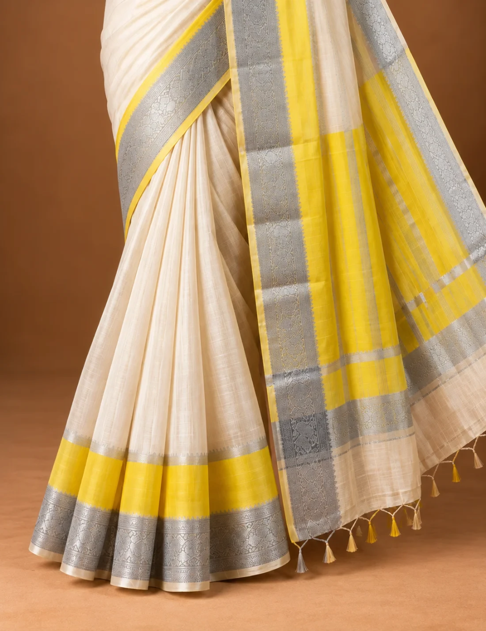 House Of Paramya ivory white Mangalagiri Pattu saree with yellow and silver zari Nizam border and textured fabric