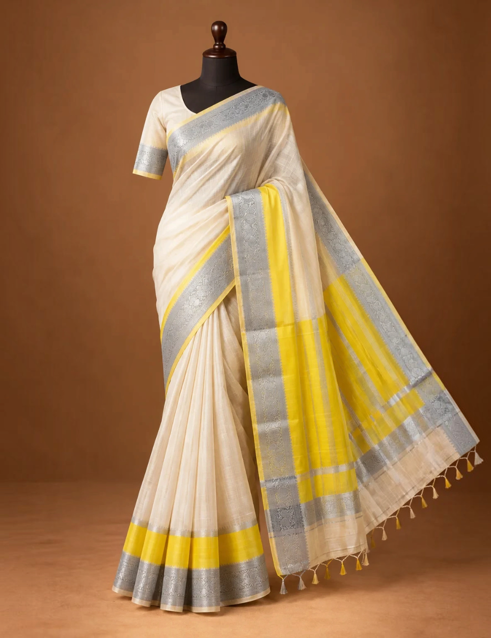 House Of Paramya ivory white Mangalagiri Pattu saree with yellow and silver zari nizam border on a mannequin