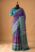 House Of Paramya purple and teal linen silk saree with traditional pen kalamkari folk art motifs and zari border.