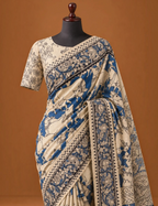 House Of Paramya beige and indigo mul cotton saree featuring hand-painted Kalamkari Pichwai motifs and geometric border