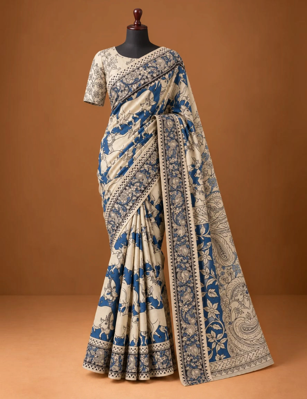 House Of Paramya beige and indigo mul cotton saree featuring hand-painted Kalamkari Pichwai motifs and geometric border
