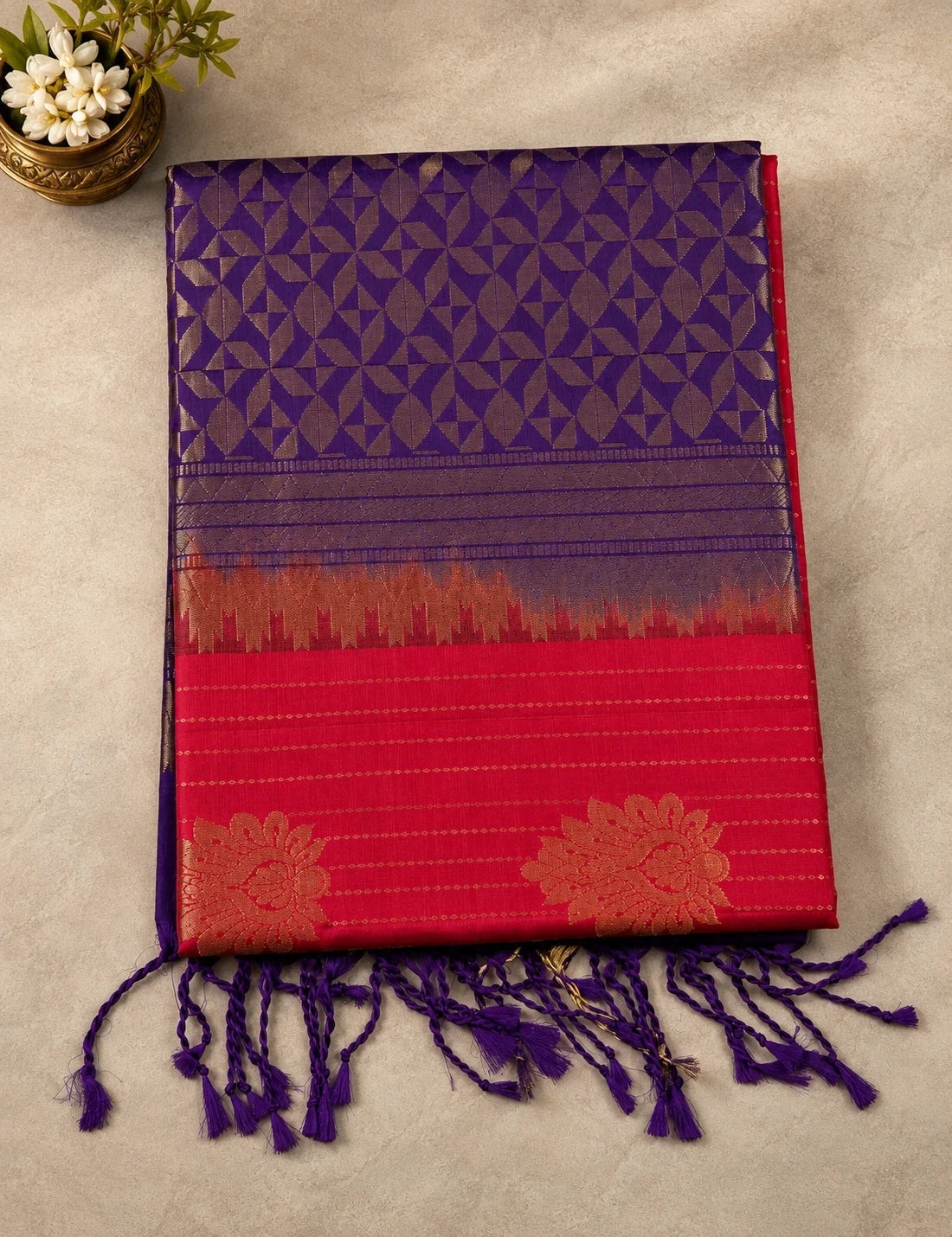 House Of Paramya pink and purple Kanchipuram silk saree with intricate gold zari floral patterns and purple tassels.