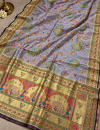 House Of Paramya lavender pashmina silk saree featuring intricate peacock meenakari motifs and a gold zari border.
