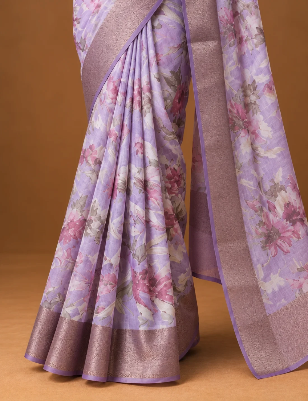 House Of Paramya lavender Tussar silk saree featuring a floral print and a woven copper zari border with motifs.