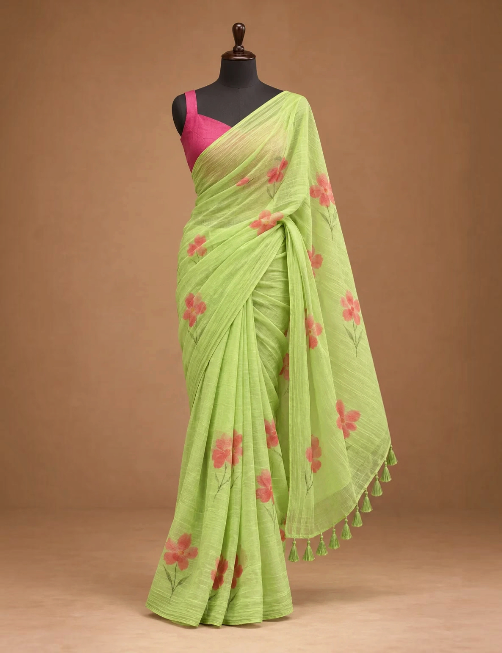 House Of Paramya lime green linen cotton saree with coral floral prints and a dark green gold border on a mannequin