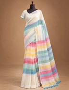House Of Paramya white linen cotton saree featuring pastel rainbow stripes and a gold border with tassel details.