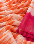 House Of Paramya orange and white linen cotton saree with shibori tie-dye print and magenta color-block tassel border