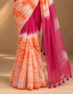House Of Paramya linen cotton saree featuring an orange and white shibori tie-dye print with a magenta color block.
