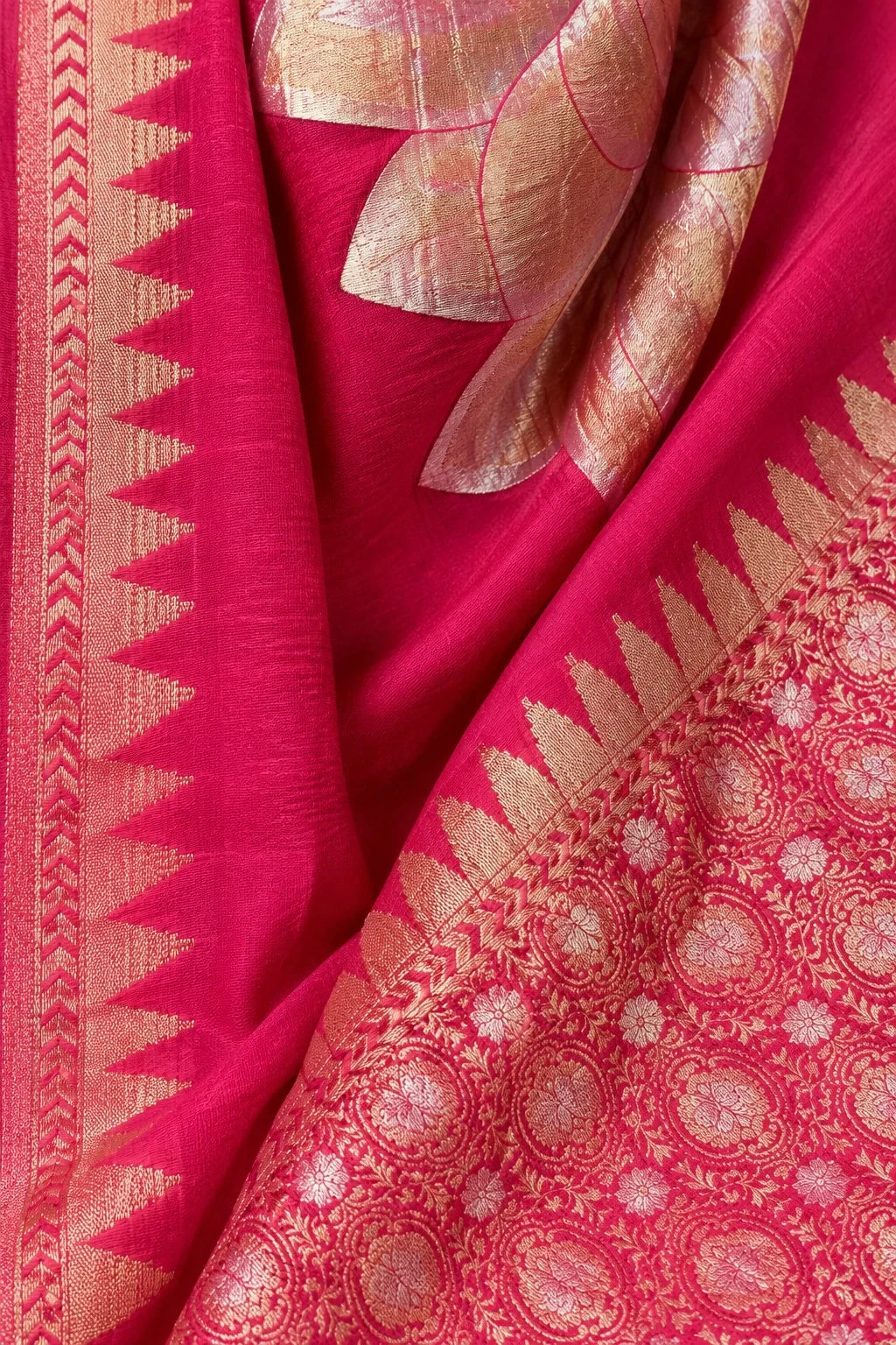 House Of Paramya magenta pink Chinon silk saree with gold leaf motif, zigzag temple border, and floral medallion hem.
