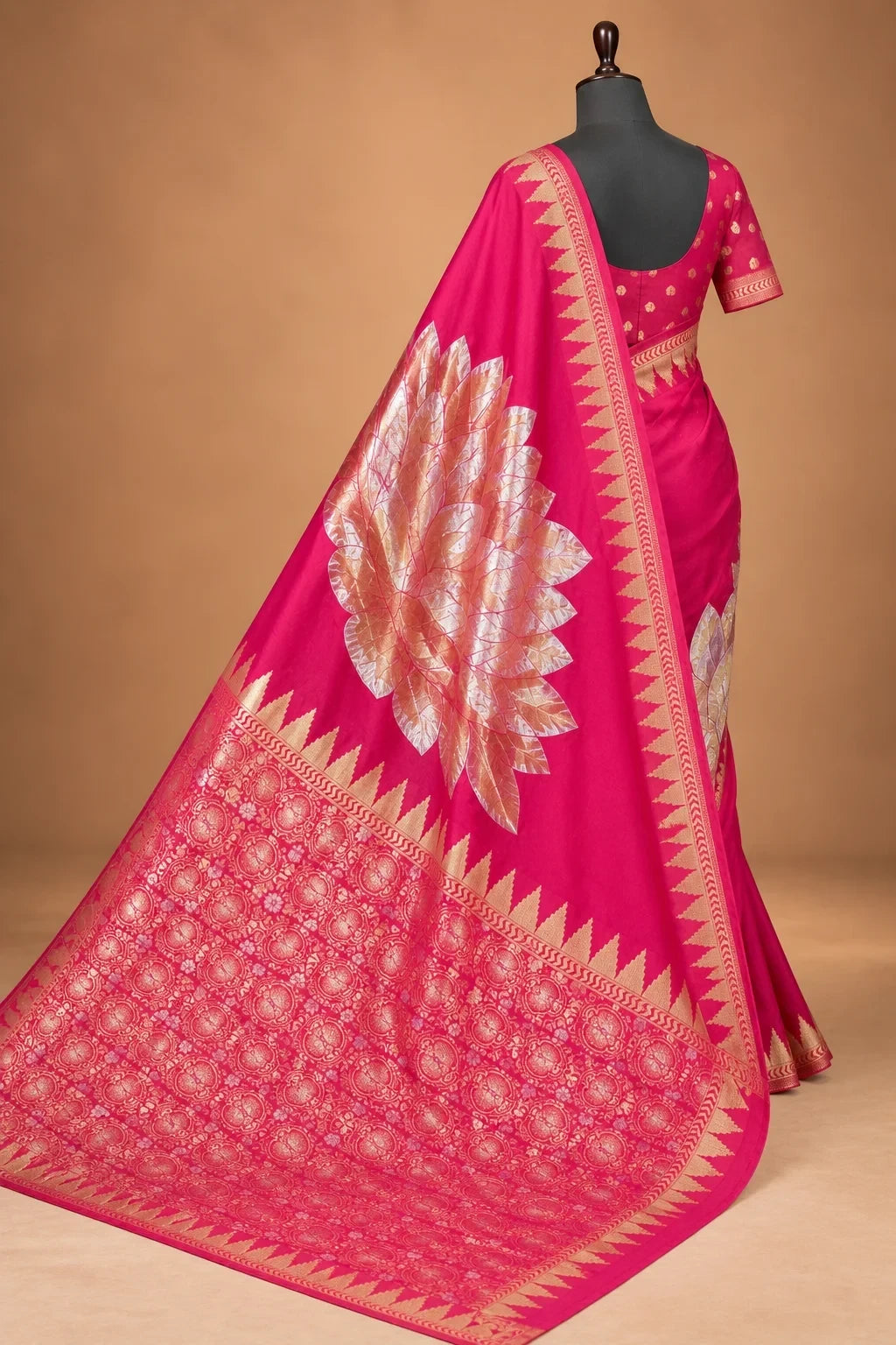 House Of Paramya magenta pink Chinon silk saree with oversized gold leaf motif and zigzag temple border on a mannequin
