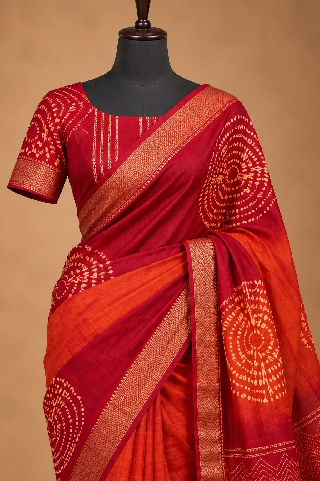 House Of Paramya maroon and orange ombre viscose vegan silk saree with gold zari border and bandhani print motifs.